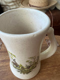 Stoneware beer stein mug with doe and fawns / small chip as seen / $8